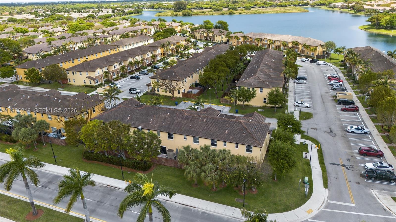 9041 Southwest 227th Street, Unit 5 Cutler Bay, FL 33190 - Photo 29 of 41 an aerial view of a house with outdoor space and lake view