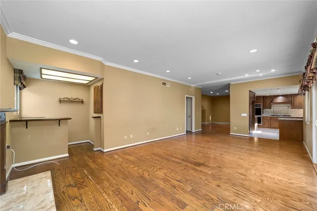 a view of a livingroom with a furniture and a ceiling fan