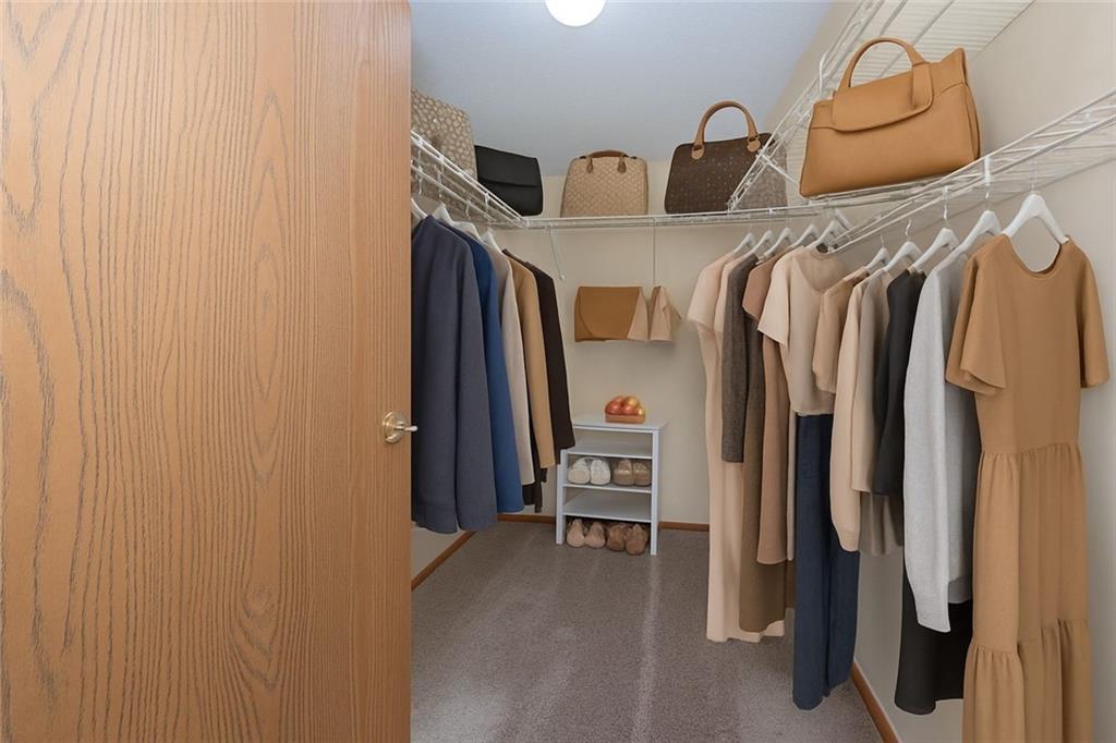 131 Pony Drive Freedom, PA 15042 - Photo 20 of 39 a view of walk in closet with clothes and shoes