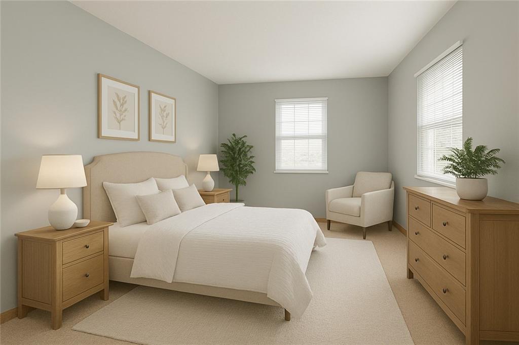 131 Pony Drive Freedom, PA 15042 - Photo 24 of 39 a bedroom with a bed and a couch