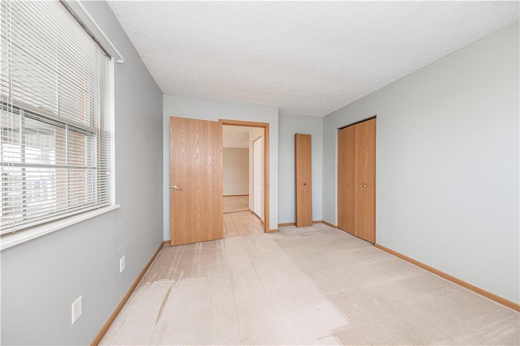 131 Pony Drive Freedom, PA 15042 - Photo 25 of 39 a view of an empty room with a window