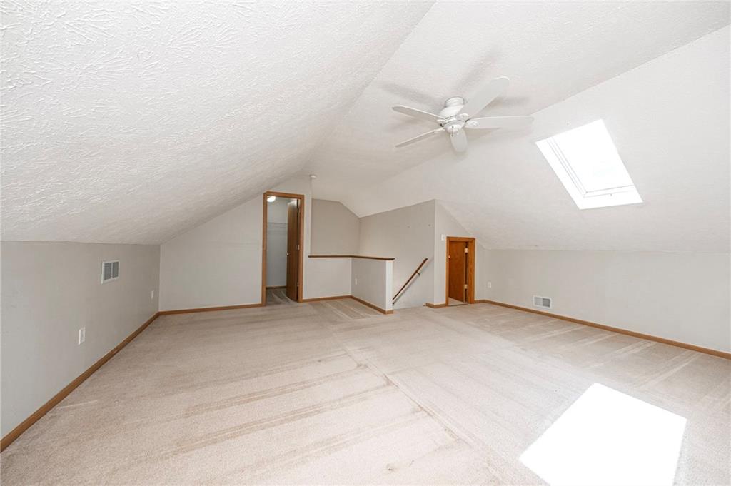 131 Pony Drive Freedom, PA 15042 - Photo 28 of 39 an empty room with closet and a ceiling fan