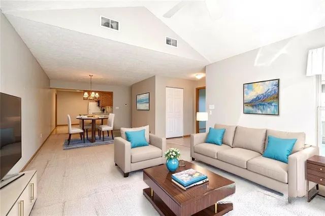 a living room with furniture and a couch