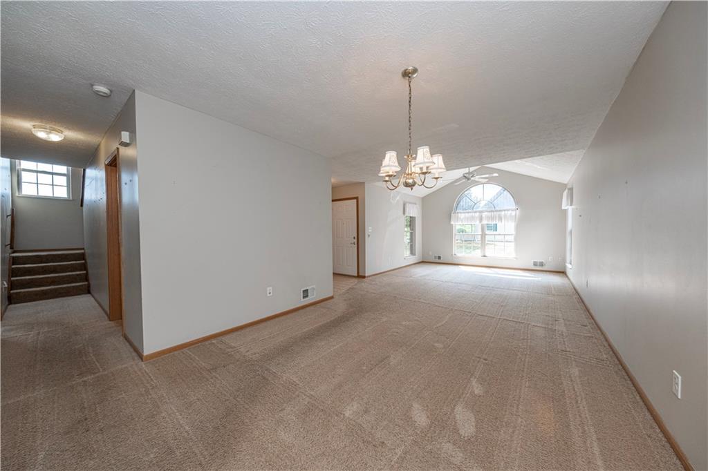131 Pony Drive Freedom, PA 15042 - Photo 8 of 39 a view of a livingroom with a chandelier