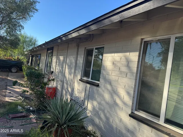 a backyard of a house with seating space