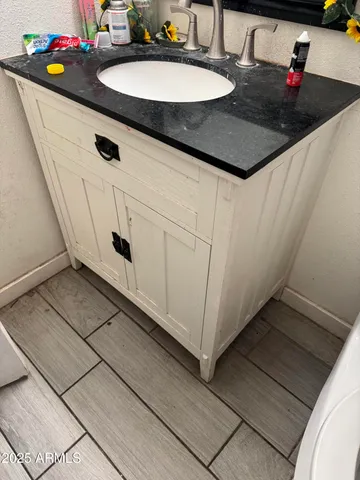 a close view of a sink and dishwasher in a kitchen