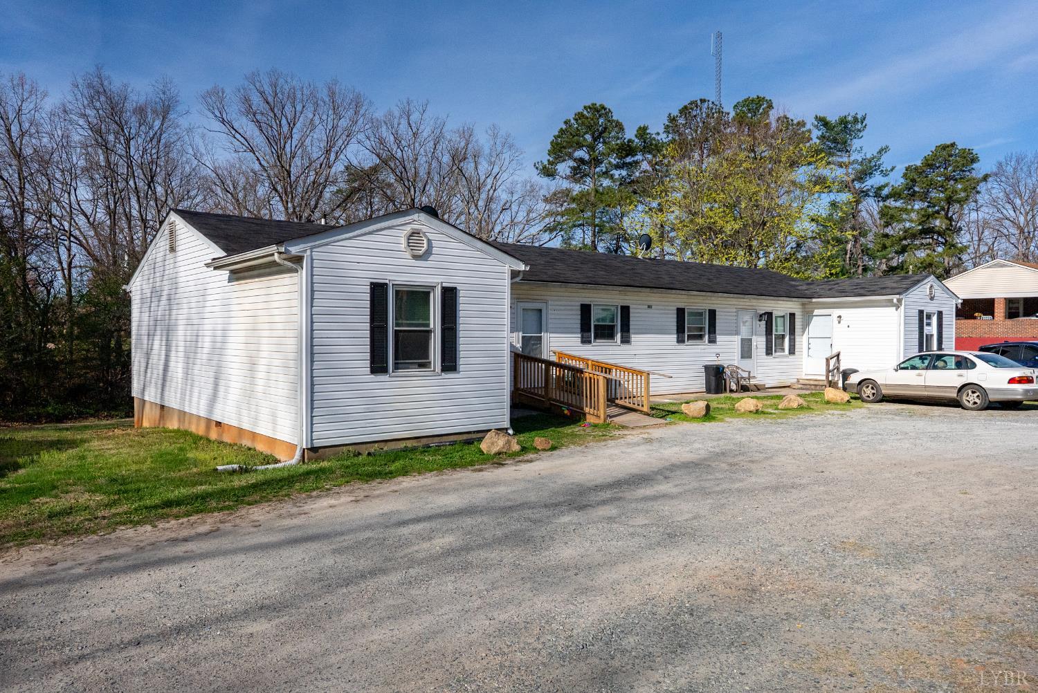 803 Henry Street Gretna, VA 24557 - Photo 6 of 15 a front view of a house with garden