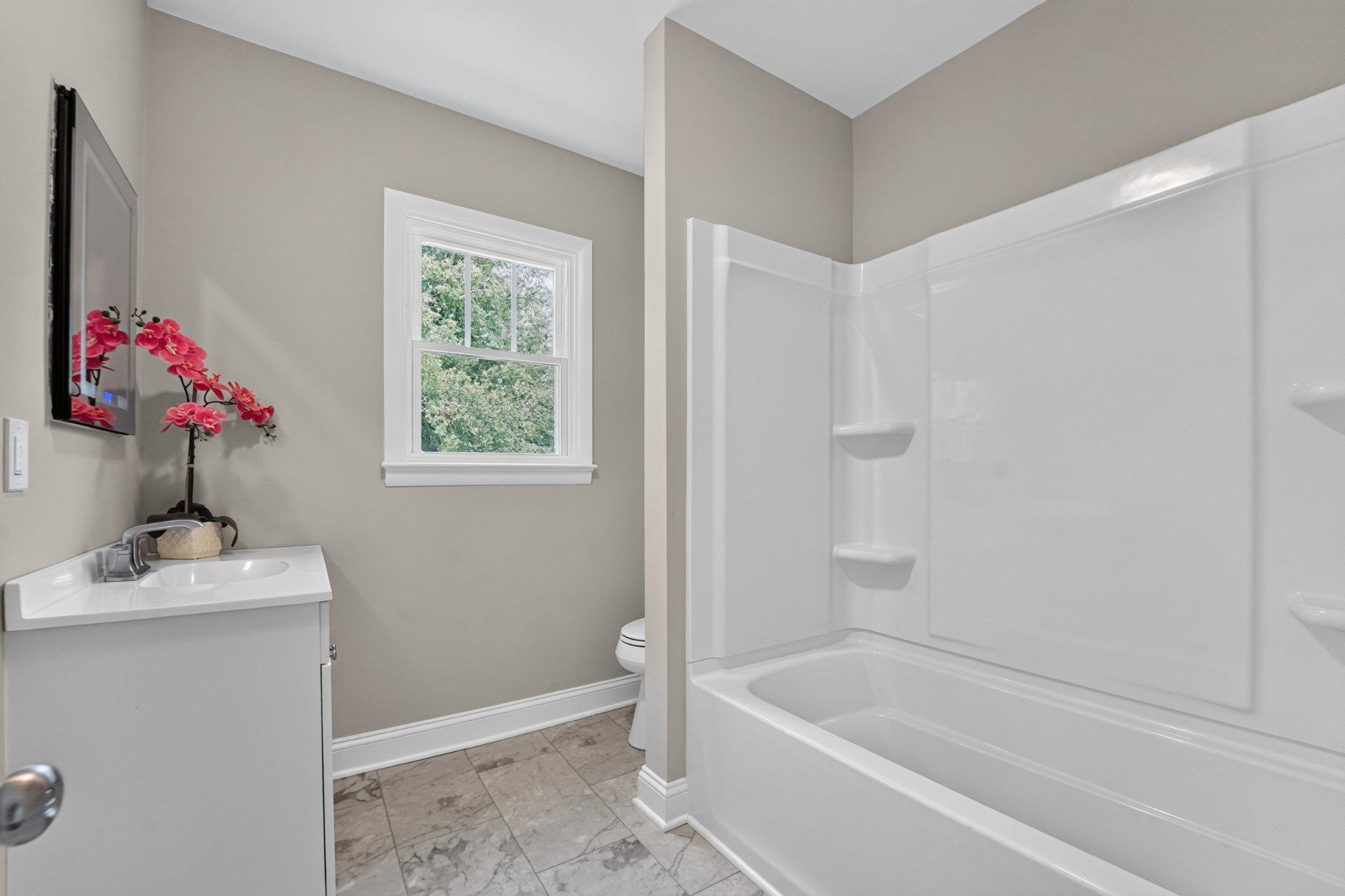 300 Woods Point Road Chester, MD 21619 - Photo 35 of 78 Completely renovated bathroom on main level