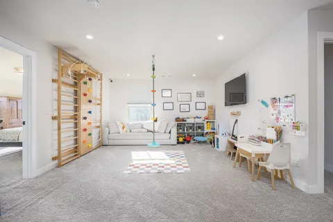 a living room with furniture and a table