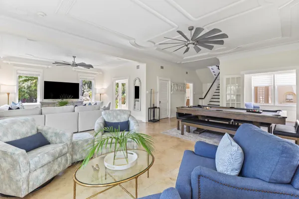 a view of a livingroom with furniture and window