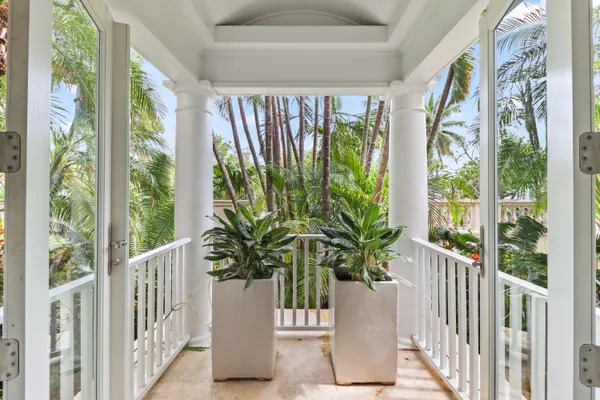 a kitchen with kitchen island granite countertop stainless steel appliances sink stove and cabinets