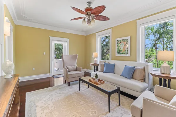 a bathroom with sink shower and mirror