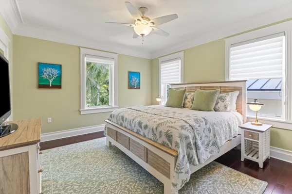 a view of a chairs and table on the roof deck
