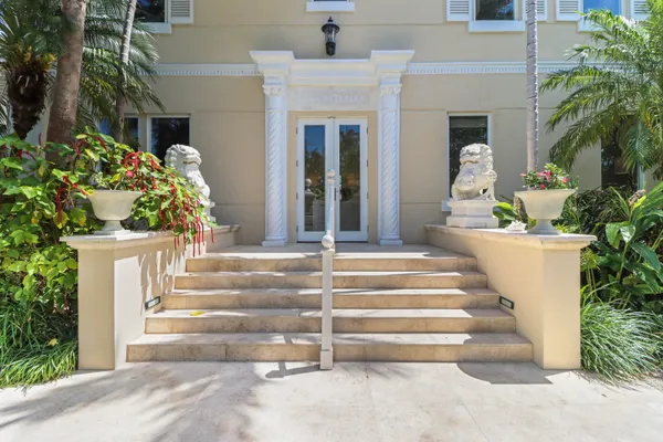a view of a livingroom with furniture and front door