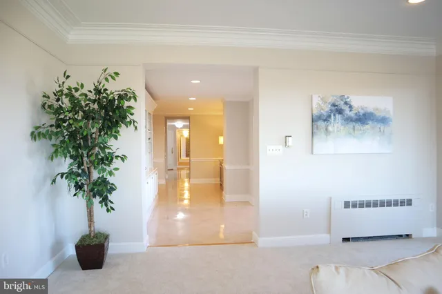 a room with a cabinets and a chair