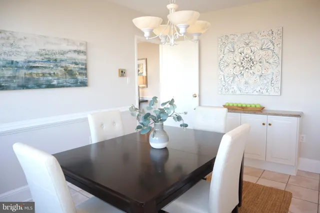 a view of a bathroom with a sink and a mirror