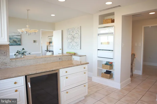 a bathroom with a sink a mirror and a shower