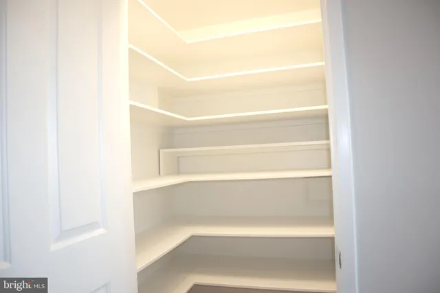 a view of a bathroom with a glass door shower