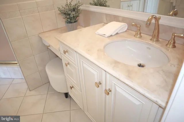 a view of a terrace with couches and potted plants