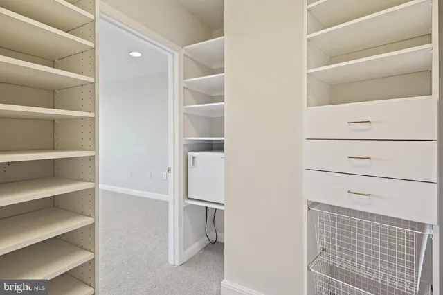 an aerial view of residential house with outdoor space and lake view