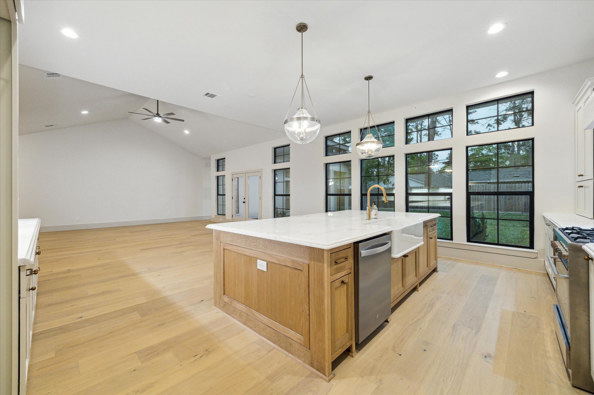 10303 Eddystone Drive Houston, TX 77043 - Photo 8 of 21 a kitchen with a stove and a sink