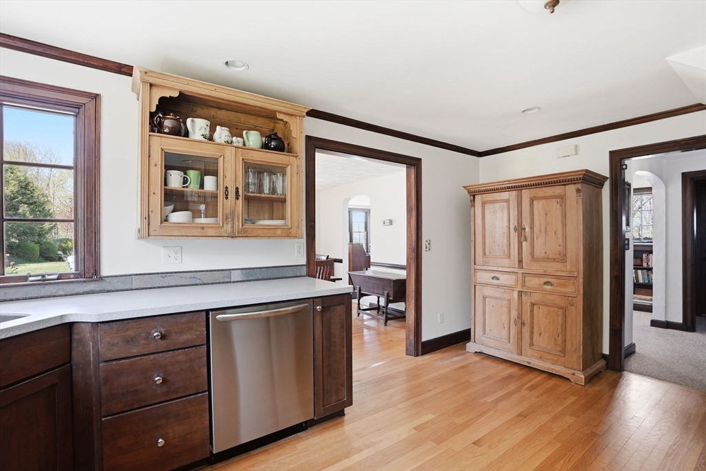 34 Governor Long Road Hingham, MA 02043 - Photo 7 of 37 a kitchen with a refrigerator and a sink