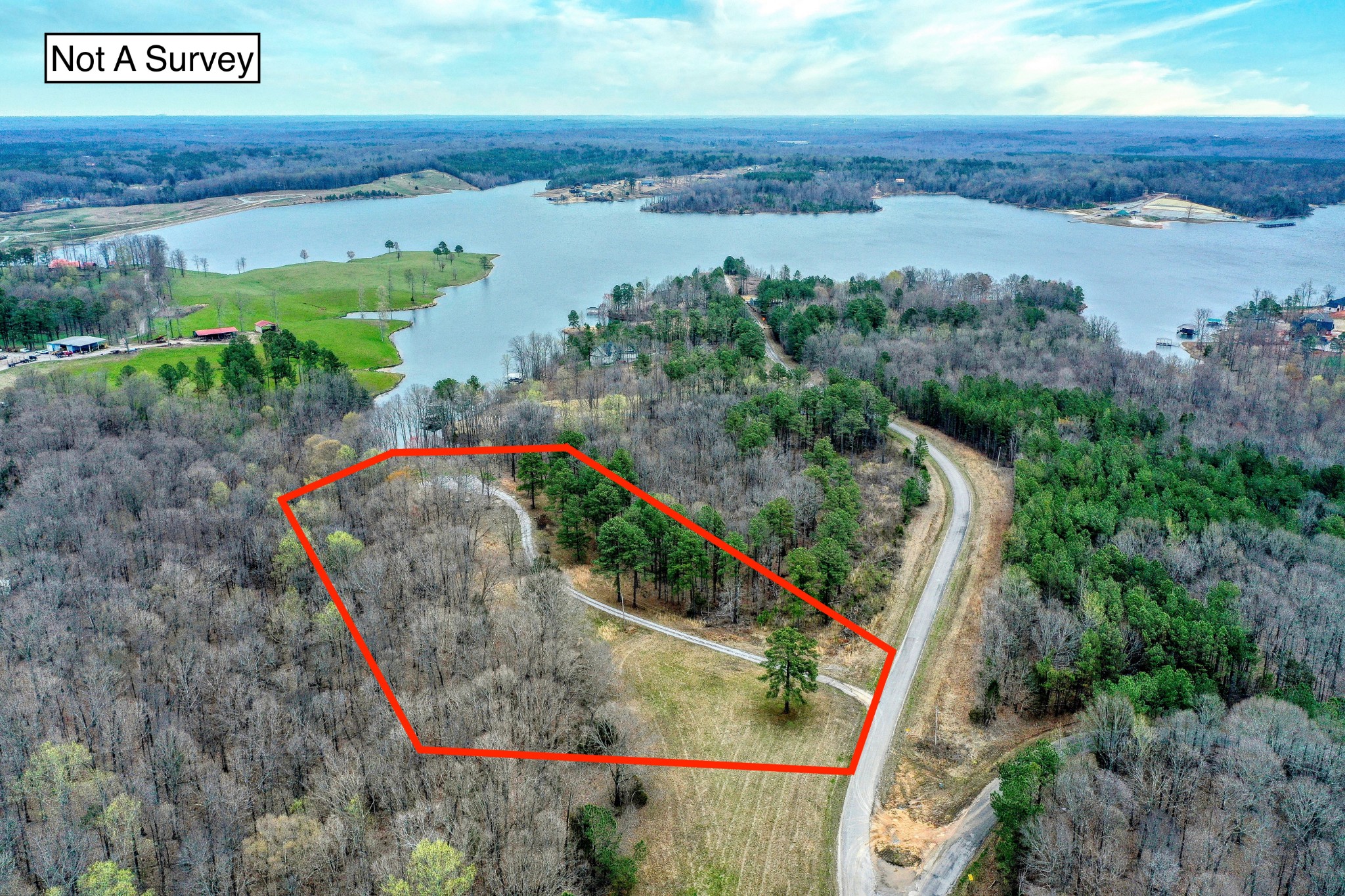 1570 Reedy Creek Road Huntingdon, TN 38344 - Photo 1 of 9 an aerial view of a houses with outdoor space and garden