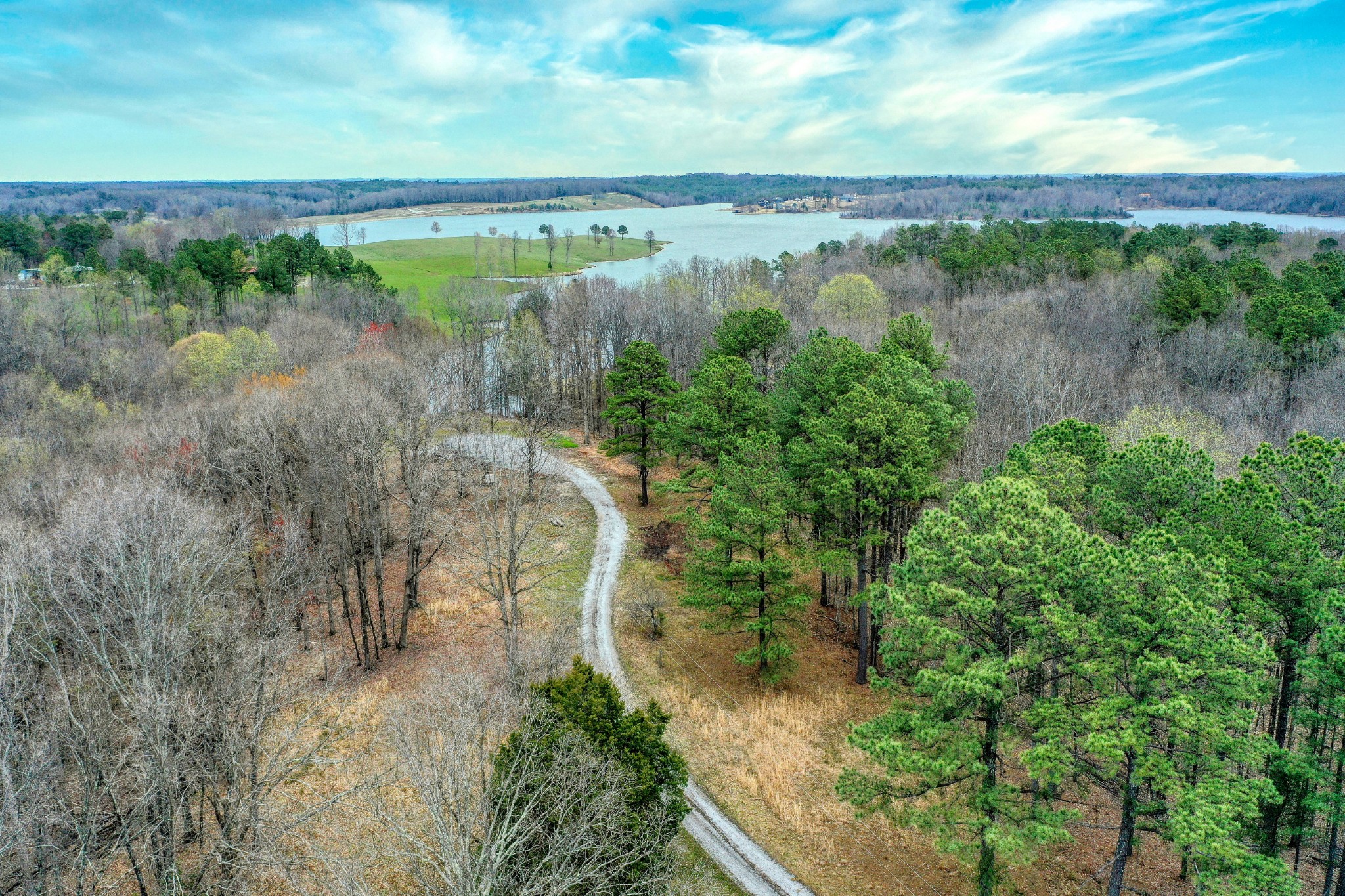 1570 Reedy Creek Road Huntingdon, TN 38344 - Photo 8 of 9 a view of a lake with outdoor space