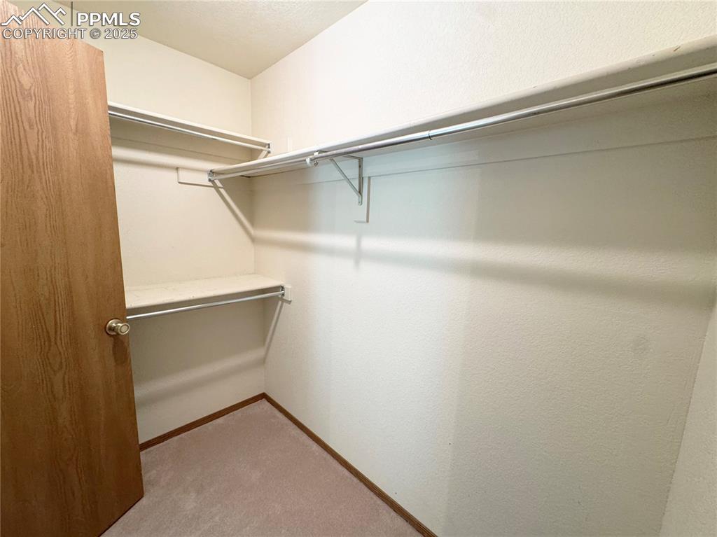 5117 Solar Ridge Drive Colorado Springs, CO 80917 - Photo 20 of 28 a view of an empty walk in closet