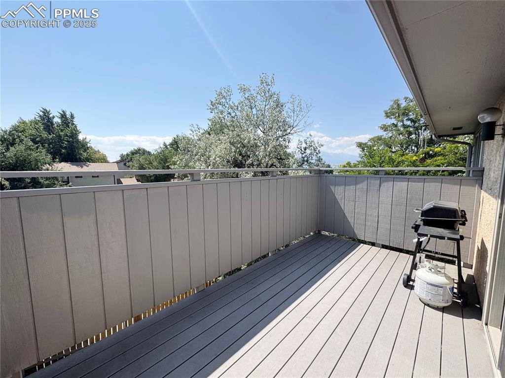 5117 Solar Ridge Drive Colorado Springs, CO 80917 - Photo 10 of 28 a view of deck with wooden floor and seating space