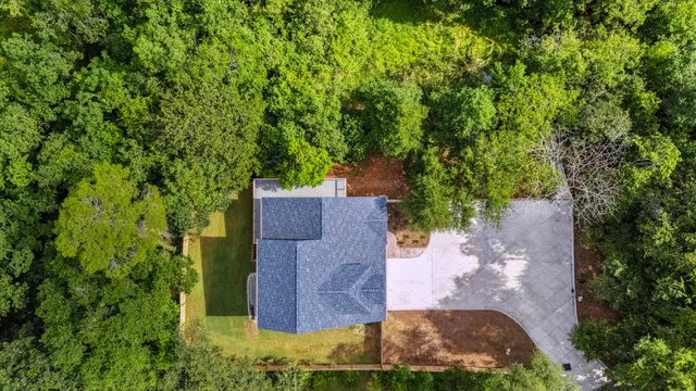 a stove top oven sitting inside of a kitchen
