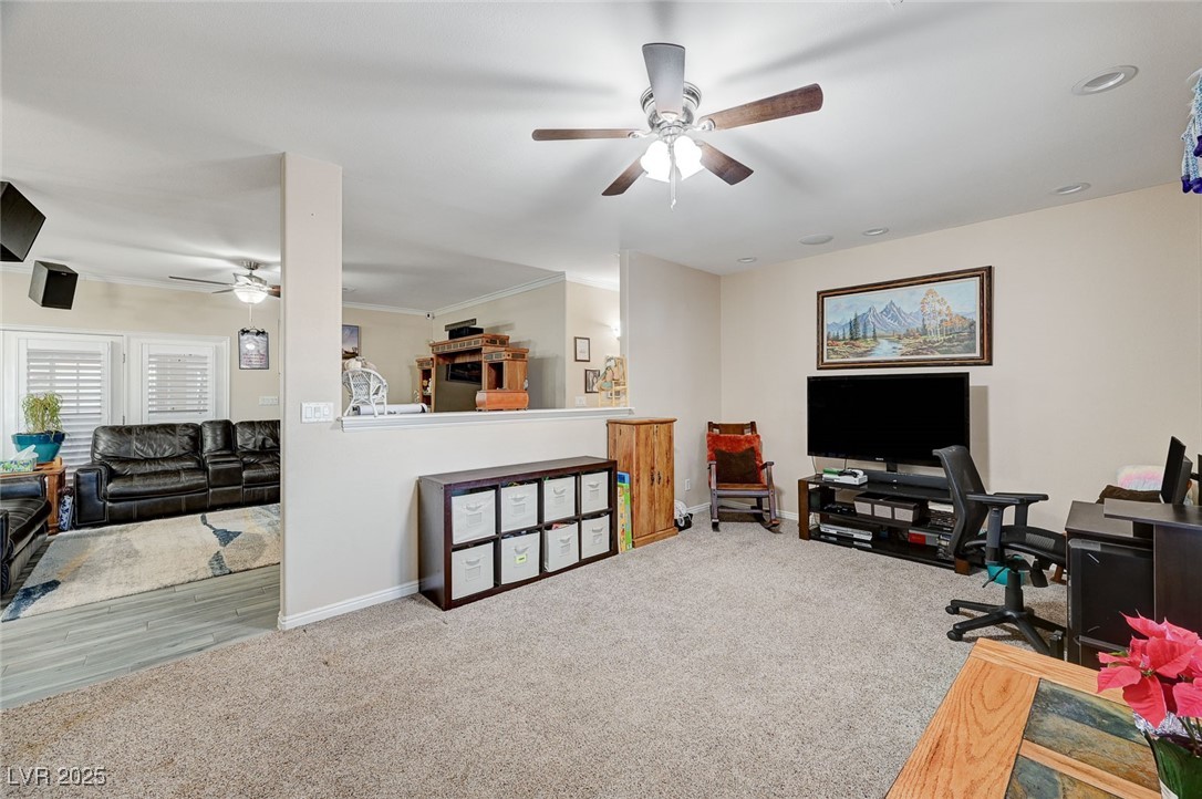 2125 Mateuse Street Logandale, NV 89021 - Photo 16 of 62 Office space featuring carpet flooring, ornamental molding, baseboards, and ceiling fan