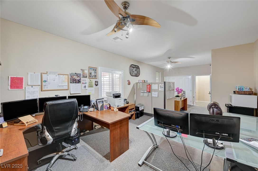 2125 Mateuse Street Logandale, NV 89021 - Photo 47 of 62 Carpeted home office featuring visible vents and a ceiling fan
