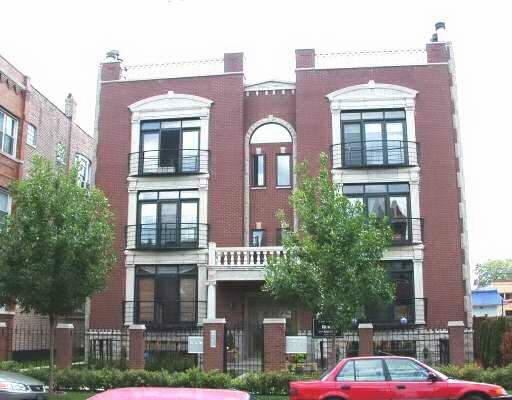 2343 West Rice Street, Unit 3 Chicago, IL 60622 - Photo 1 of 1 a front view of a multi story building