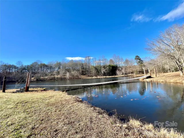 a view of lake with green space