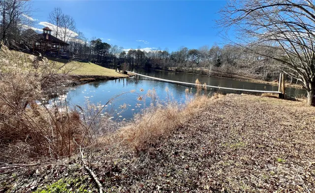 a view of swimming pool with a yard