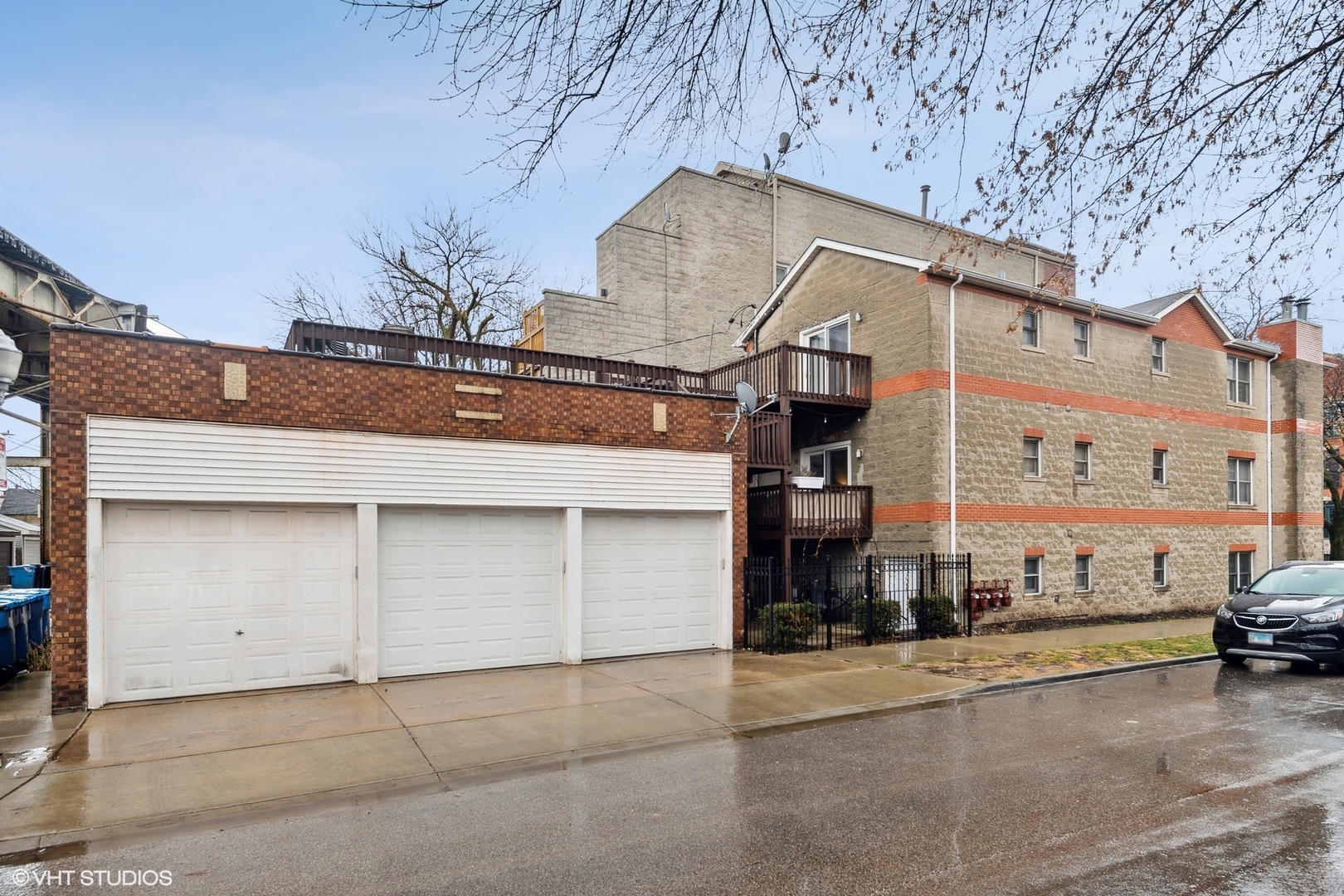1756 West Roscoe Street Chicago, IL 60657 - Photo 18 of 19 a view of a street that has couple of cars parked on the road