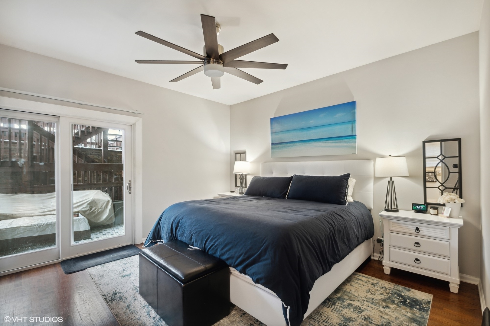 1756 West Roscoe Street Chicago, IL 60657 - Photo 8 of 19 a bedroom with a large bed and a window