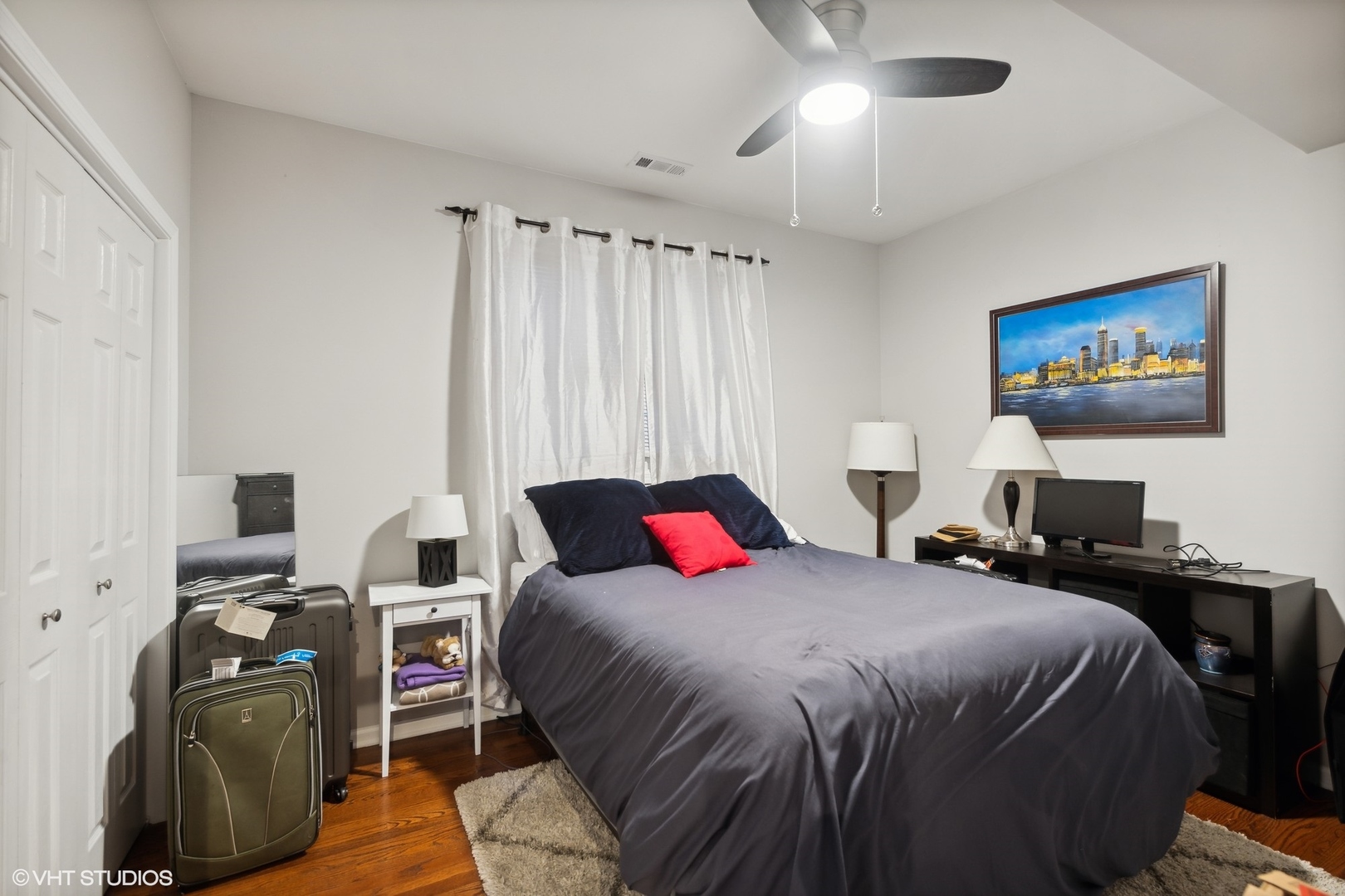 1756 West Roscoe Street Chicago, IL 60657 - Photo 10 of 19 a bedroom with a bed and furniture