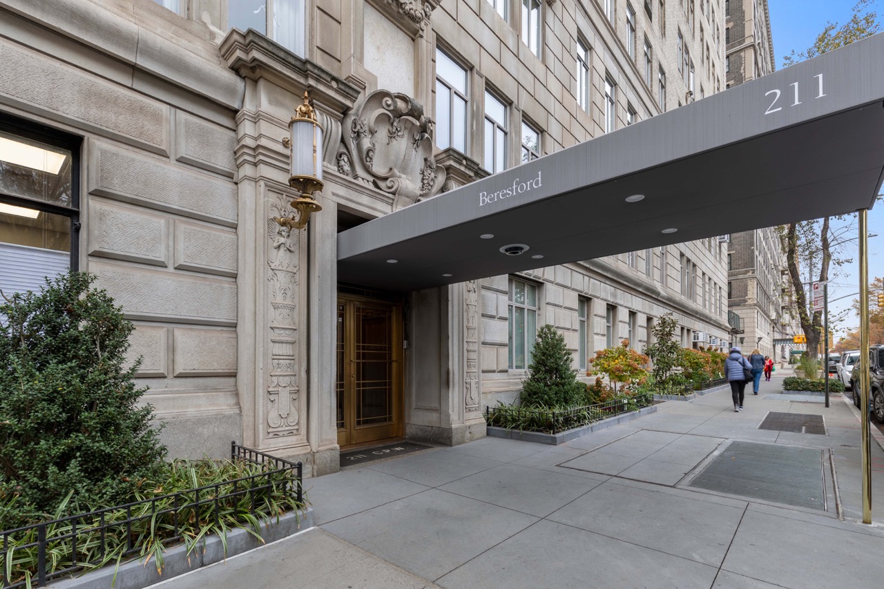 211 Central Park West, Unit 8E Manhattan, NY 10024 - Photo 12 of 14 a view of a building with a street