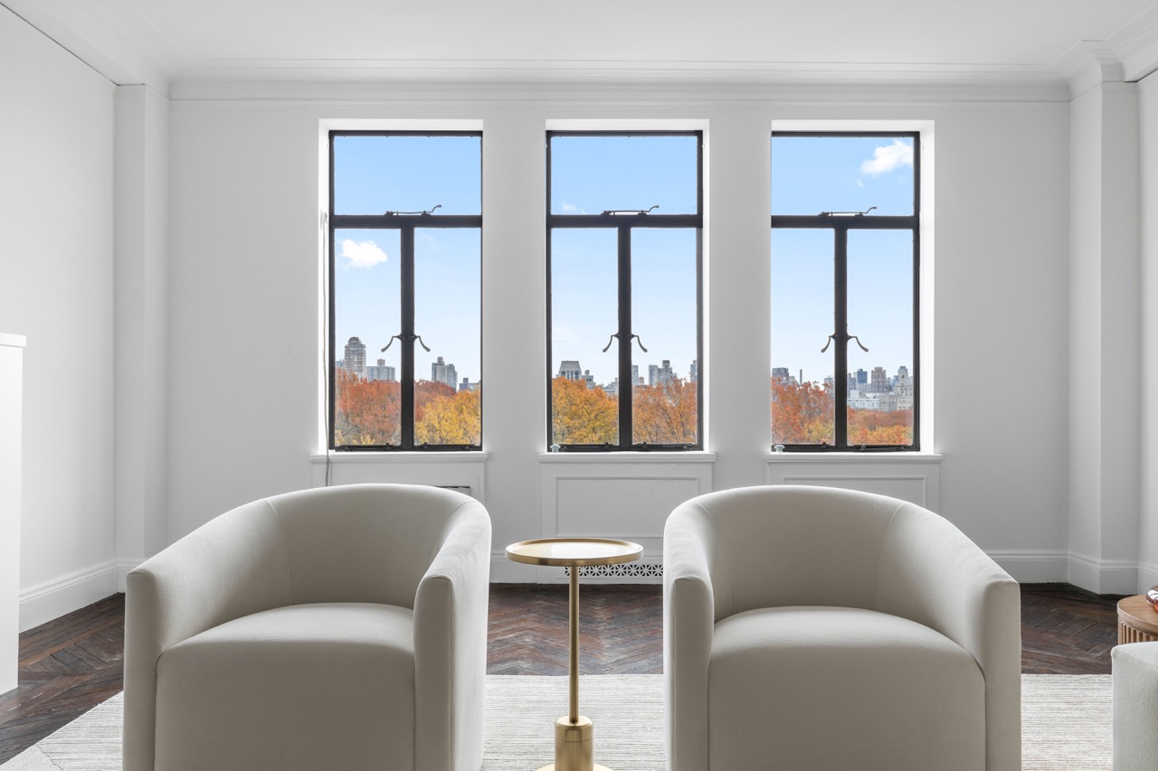 211 Central Park West, Unit 8E Manhattan, NY 10024 - Photo 4 of 14 a living room with furniture and windows