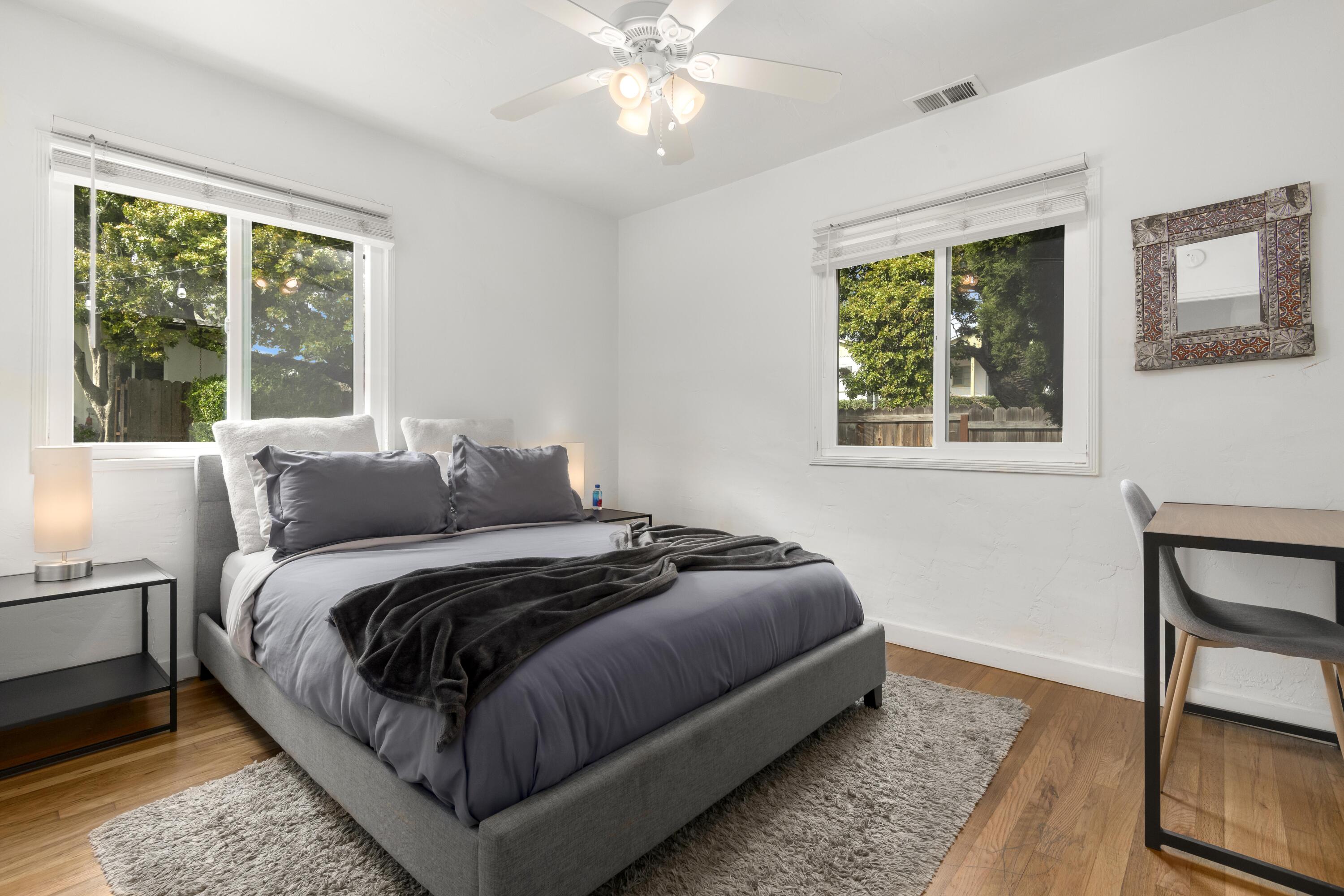 1102 Del Mar Avenue Santa Barbara, CA 93109 - Photo 16 of 39 a bed sitting in a bedroom next to a window