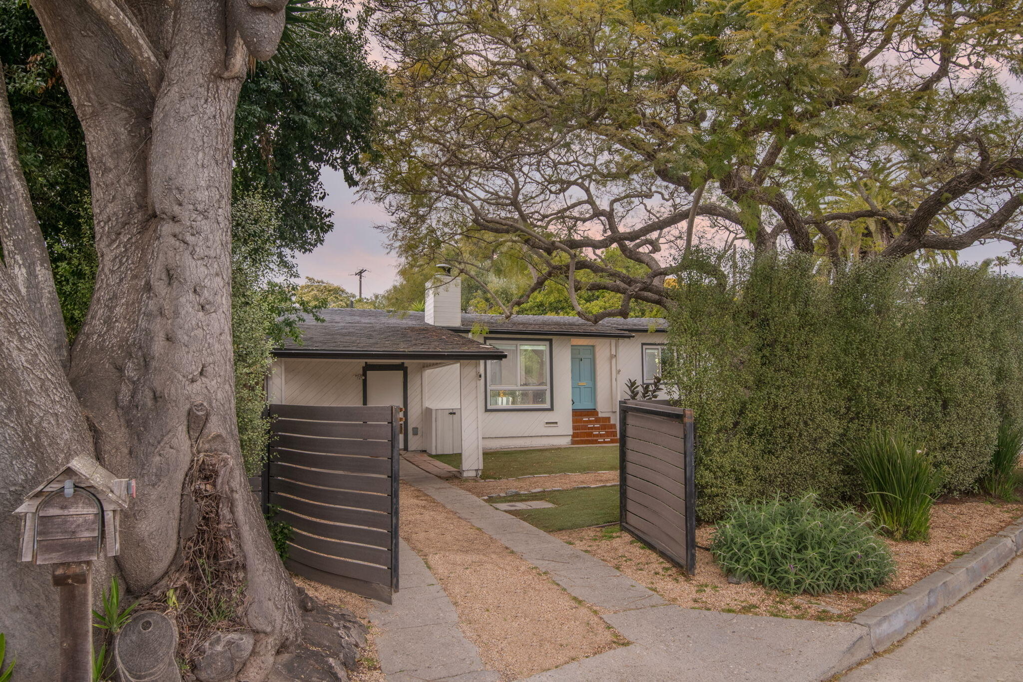 1102 Del Mar Avenue Santa Barbara, CA 93109 - Photo 2 of 39 a view of a house with a tree beside it
