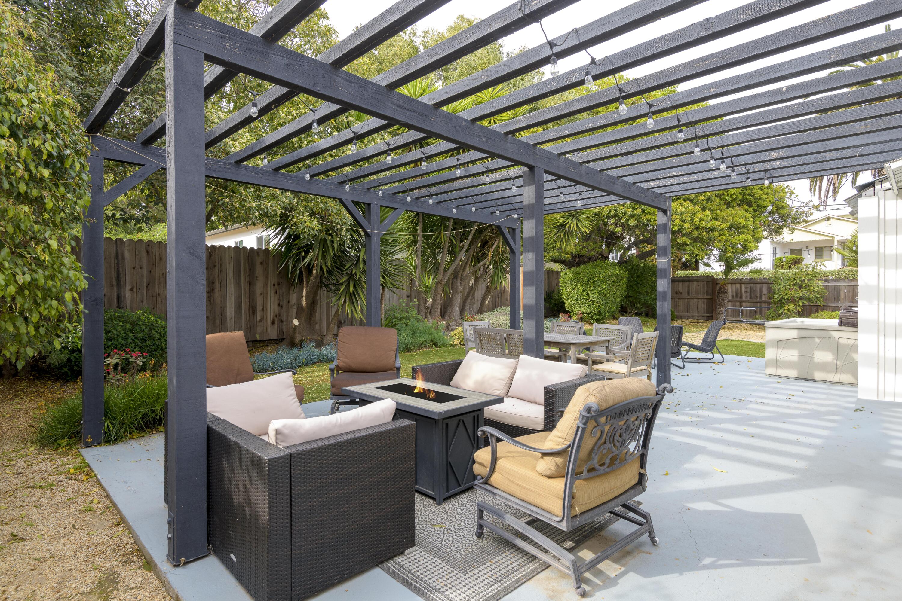 1102 Del Mar Avenue Santa Barbara, CA 93109 - Photo 21 of 39 a view of a patio with a table and chairs
