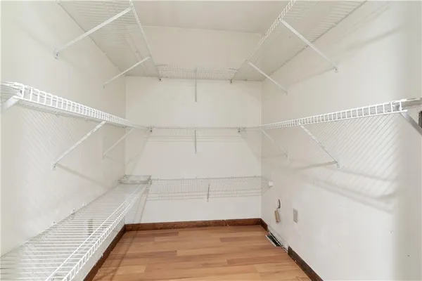 a view of a room with racks on the wall