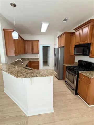 a view of a kitchen storage and utility room
