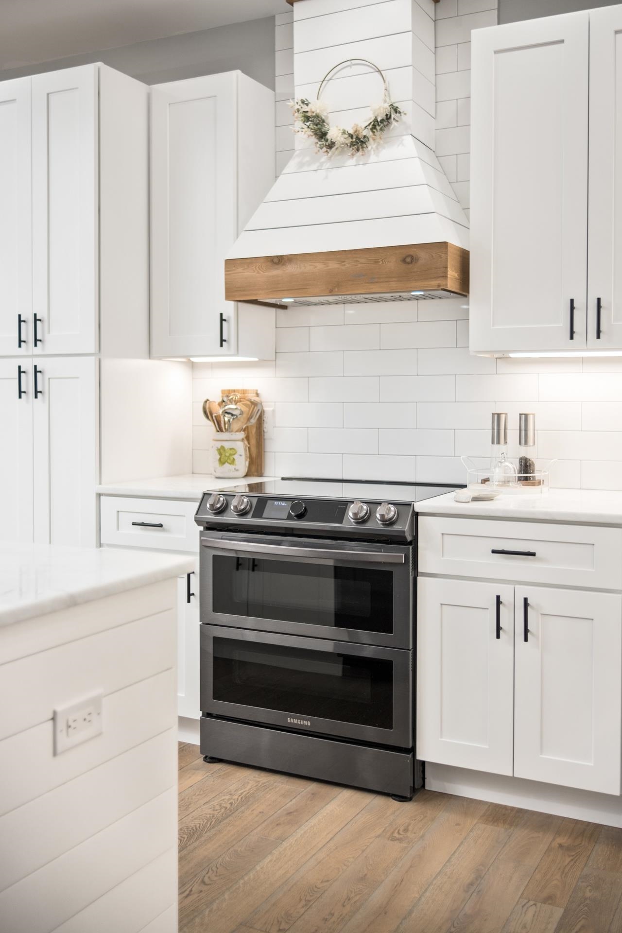303 Bartley Street Dayton, VA 22821 - Photo 13 of 47 a kitchen with cabinets appliances and a sink