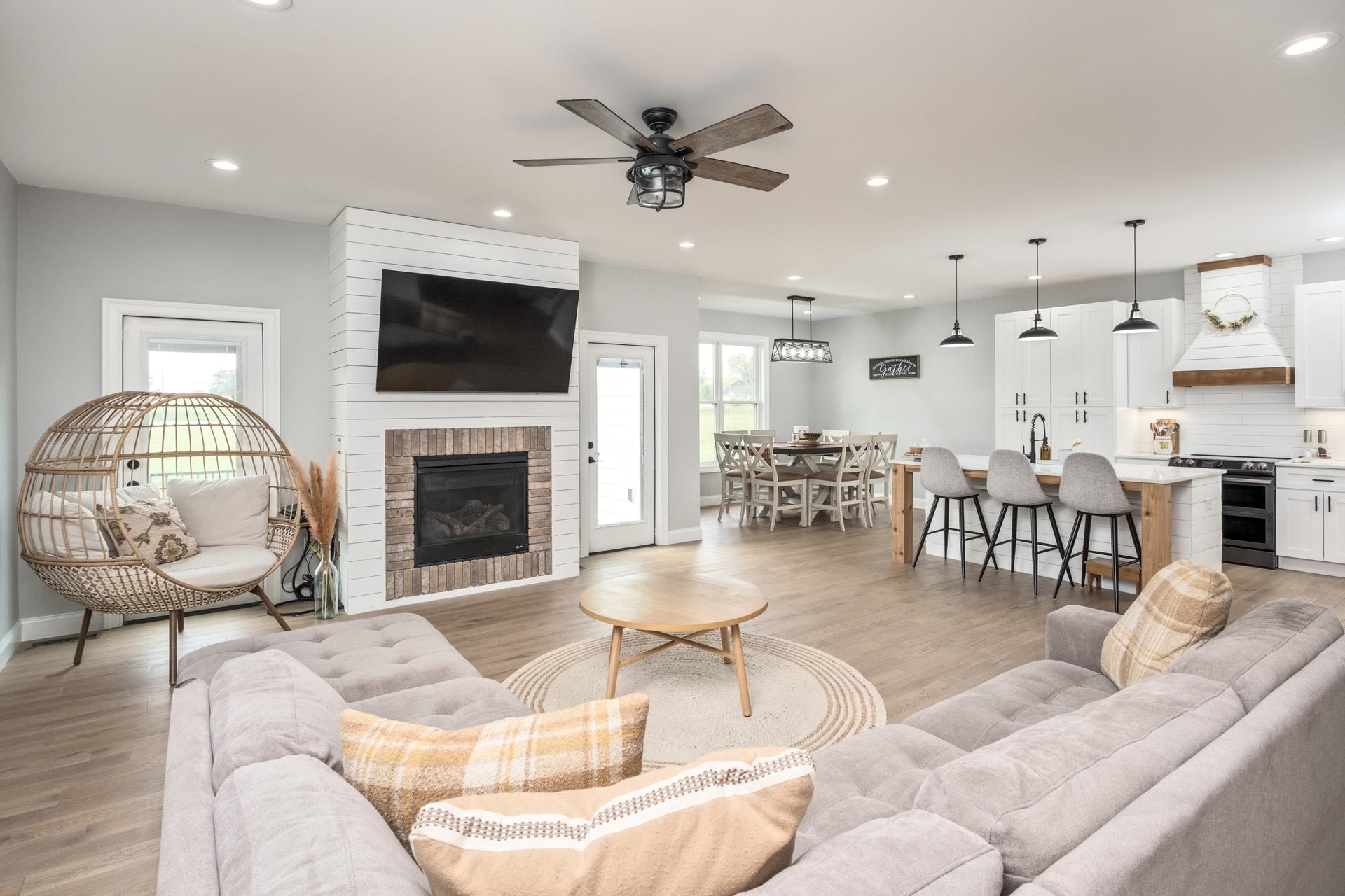 303 Bartley Street Dayton, VA 22821 - Photo 15 of 47 a living room with furniture a flat screen tv and a fireplace