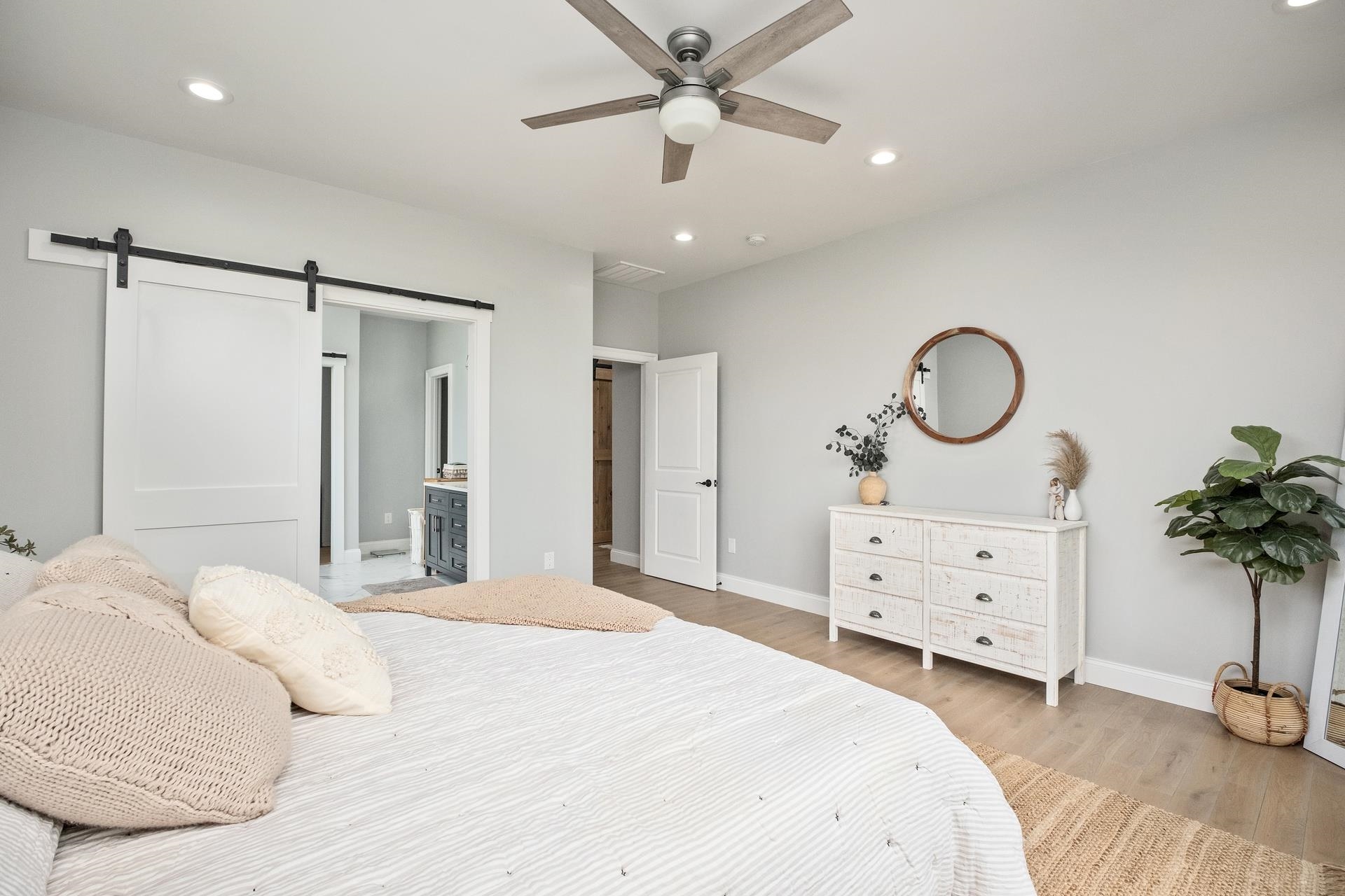 303 Bartley Street Dayton, VA 22821 - Photo 22 of 47 a bedroom with a bed chandelier and a dresser