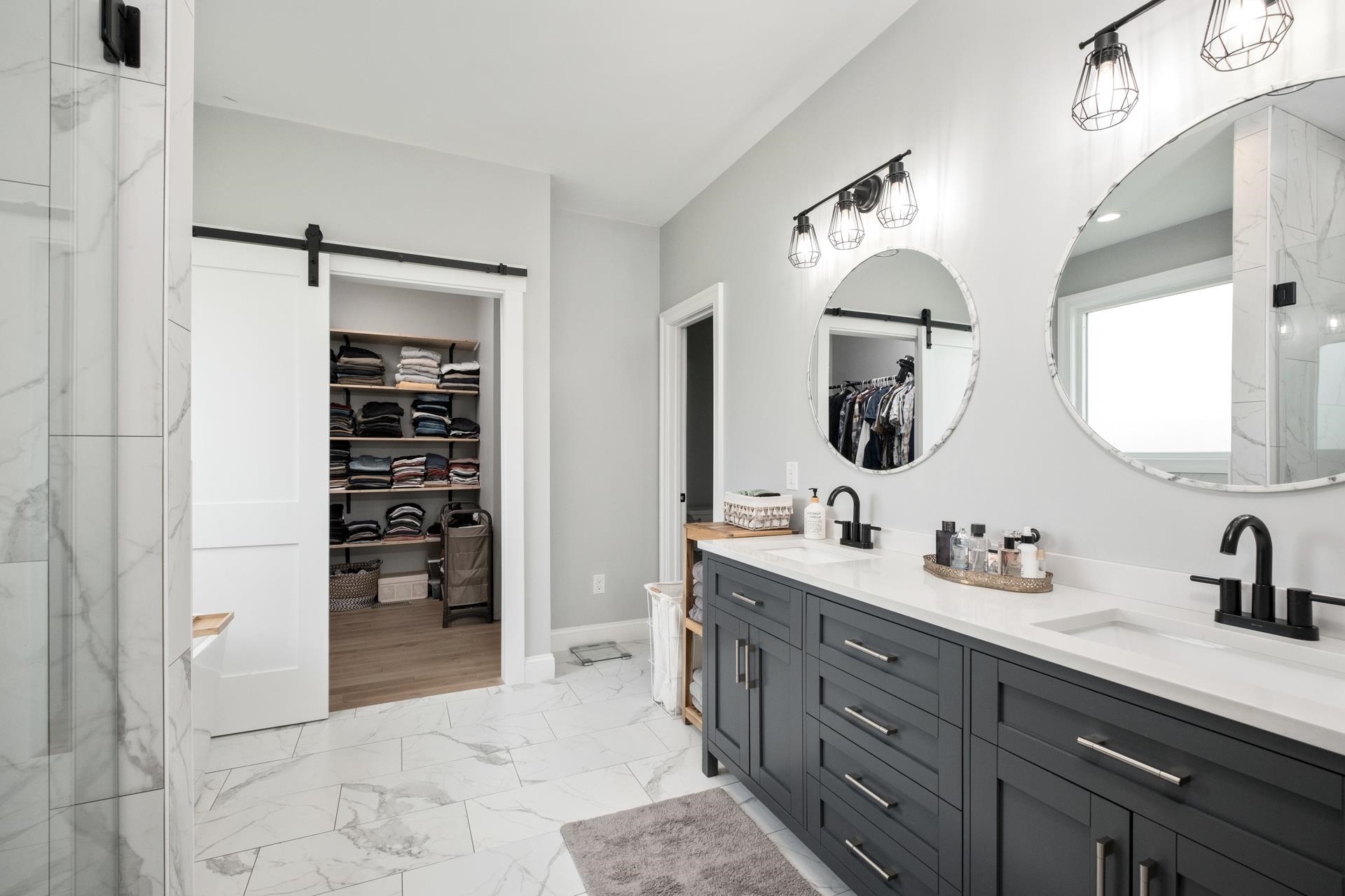 303 Bartley Street Dayton, VA 22821 - Photo 23 of 47 a spacious bathroom with a double vanity sink mirror and double